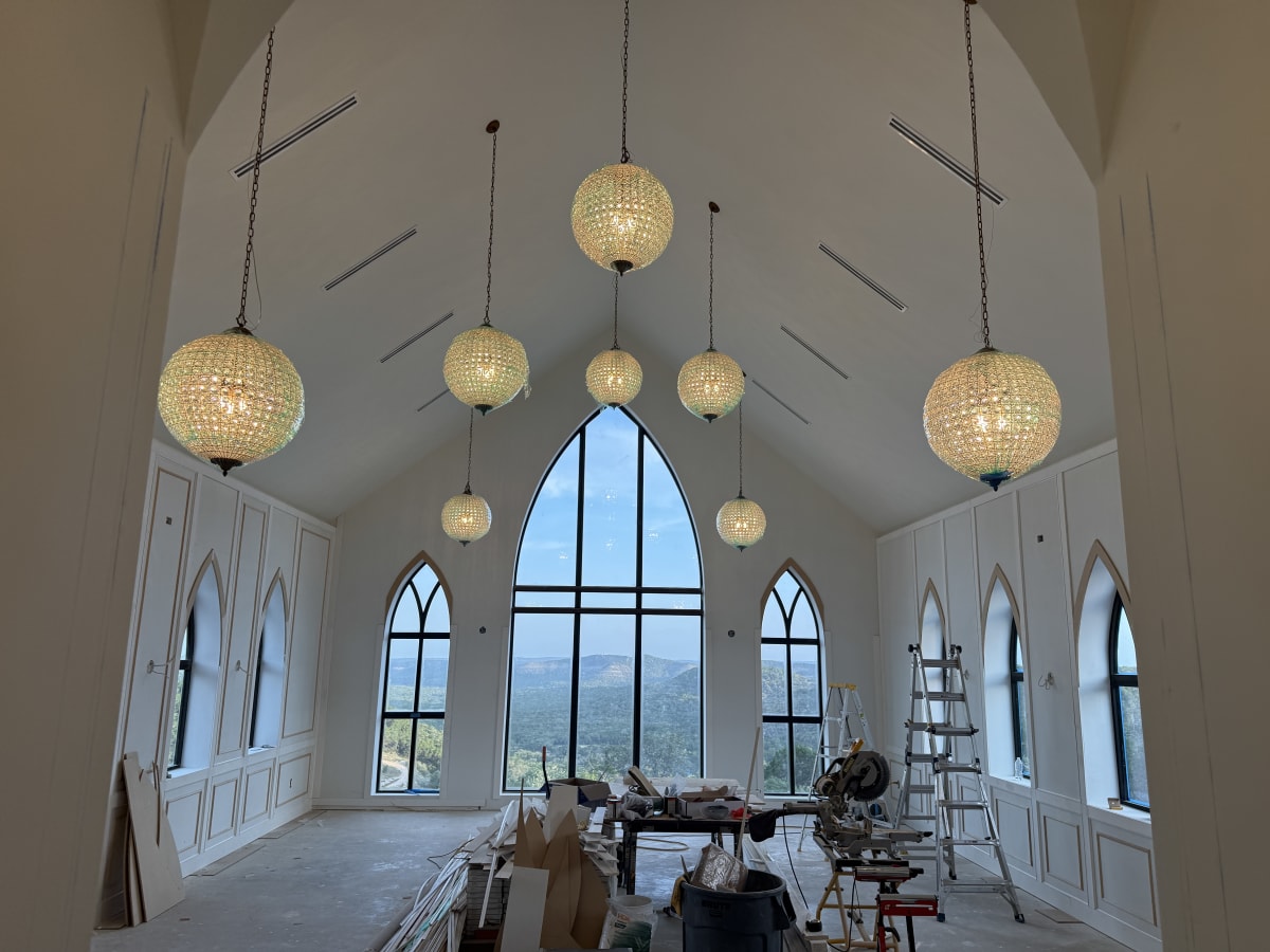 Chandeliers glowing inside the chapel